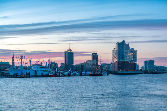 Hamburg skyline along the Elbe River at sunrise