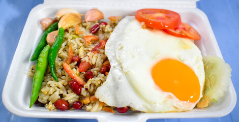 Tea leaf and rice salad called laphet htamin. Favorite street food in Asia, Myanmar.