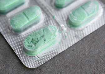 Crushed and damaged tablets.  Concept of expired drugs.