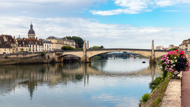 Chalon-sur-Saone, France, beautiful stone arch bridge over the Saone river in Saint-Remy