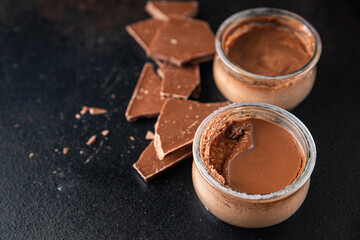 chocolate pudding souffle cocoa cream, cream, vanilla sweet dessert healthy meal food snack on the table copy space food background rustic top view