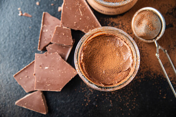 chocolate pudding souffle cocoa cream, cream, vanilla sweet dessert healthy meal food snack on the table copy space food background rustic top view