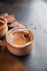 chocolate pudding souffle cocoa cream, cream, vanilla sweet dessert healthy meal food snack on the...
