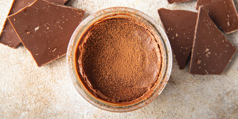 chocolate pudding souffle cocoa cream, cream, vanilla sweet dessert healthy meal food snack on the table copy space food background rustic top view
