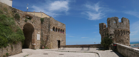the Torricella and the entrance arch into the old city through the city walls of the Swabian Castle in Termoli