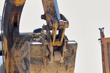 Heavy construction machines outdoors for public place reconstruction.