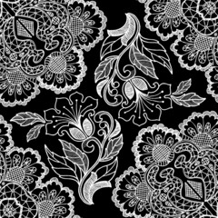 Graphic flowers with lace on black background. Floral seamless pattern.