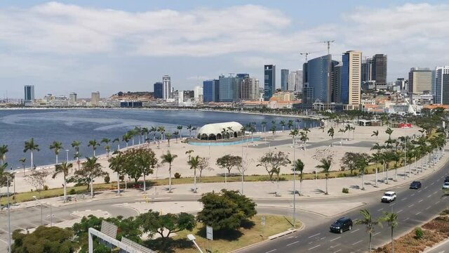 Aerial drone footage of downtown Luanda, bay, Port of Luanda, marginal with residential and office buildings, metropolitan and business area of Luanda, in Angola