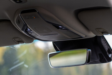 Fototapeta na wymiar The rear view mirror inside the car.