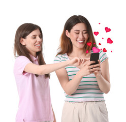 Beautiful young women with phone sending love message on white background