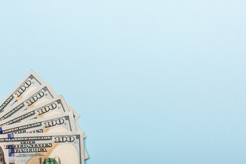 Hundred dollar bills background, top view with empty space for text	