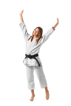 Happy female karate instructor on white background