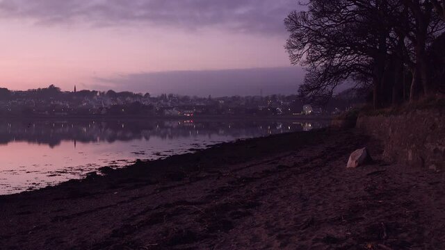 The beautiful beach at an amazing nighjt at Culmore Point near Derry, Northern Ireland