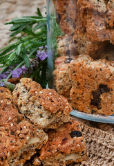 Glass jar with Traditional South African health rusks on rustic table