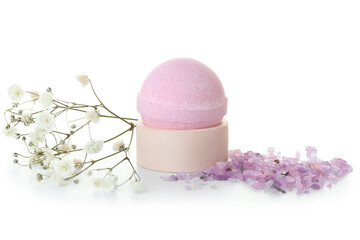 Bath bomb, sea salt and gypsophila flowers on white background