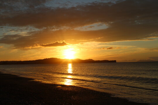 Sunset on the beach. Picture is taken in Acharavi, Nort of Corfu, a Greek isand. 