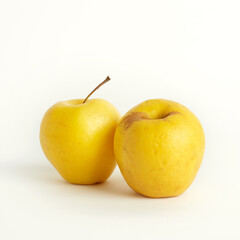 Shriveled yellow apples isolated on white background. Ugly food concept