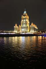 Fototapeta na wymiar Krasnopresnenskaya embankment, view of the Radisson Collection Hotel, Moscow. Russia