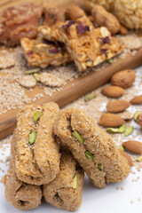 Indian traditional sweets Mithai Gajjak Also Known As Gur Gajjak, Gazak Gachak Is Made Of Jaggery Gud til or sesame seed Almonds Badam And Pistachio prepared during Makar Sankranti Lohri