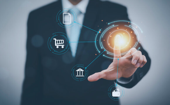 Business using thumb to scan finger print or for digital processing biometric identification to access security system includes internet banking, cloud system and mobile phone,Cyber security concept.