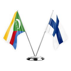 Two table flags isolated on white background 3d illustration, comoros and finland