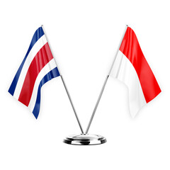 Two table flags isolated on white background 3d illustration, costa rica and indonesia