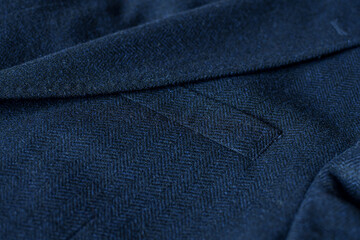 Naklejka premium Detail of men casual outwear, blue woolen blazer, with a pocket fragment.