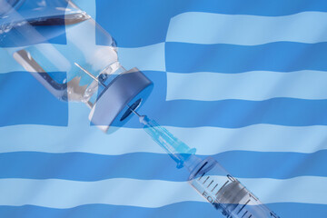 Corona virus vaccine and Greece flag, Vaccines and syringes on a light blue background