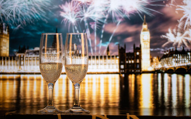 champagne glasses and Big Ben in background New Year's eve in London