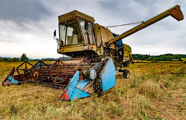old rusty harvester