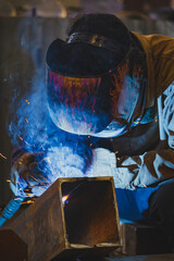Welding of metal structures by semi-automatic arc welding. MIG welding.