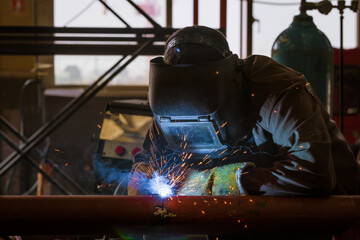 Welding of metal structures by semi-automatic arc welding. MIG welding.