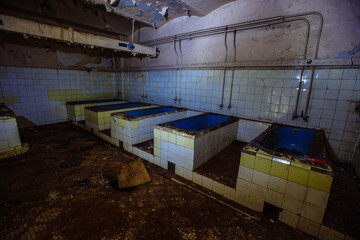 Creepy bath room in old abandoned hospital