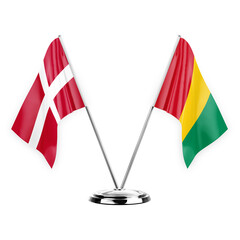 Two table flags isolated on white background 3d illustration, denmark and guinea