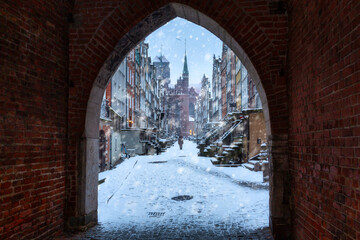 Gate to the historical Mariacka street in Gdansk at snowy winter, Poland