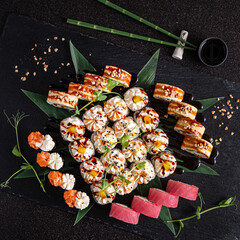 tasty sushi on the black background