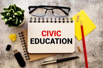 Paper plate,marker, diagram,chart and office tools. Text CIVIC EDUCATION.