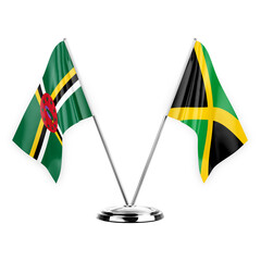 Two table flags isolated on white background 3d illustration, dominica and jamaica