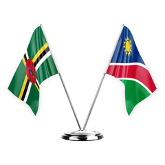 Two table flags isolated on white background 3d illustration, dominica and namibia