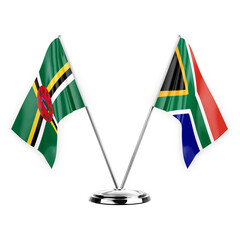 Two table flags isolated on white background 3d illustration, dominica and south africa