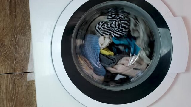 Baby clothes are washed in the washing machine