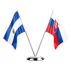 Two table flags isolated on white background 3d illustration, el salvador and slovakia