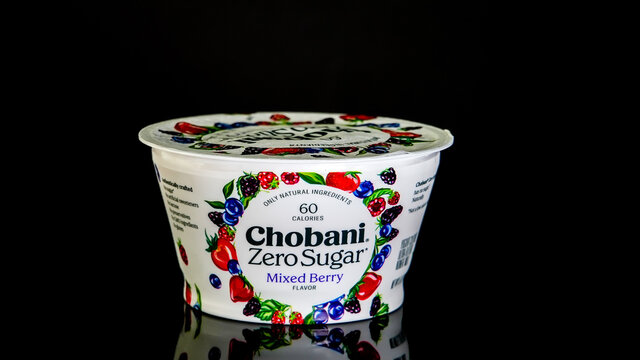 Chobani Zero sugar mixed  berry yogurt on black background
