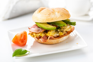 sandwich with bacon, egg and avocado