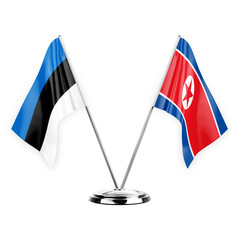 Two table flags isolated on white background 3d illustration, estonia and north korea