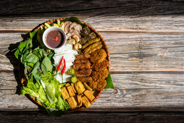 Vietnamese food set, bun dau mam tom, popular street food made from vermicelli with boiled pork,...