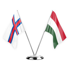 Two table flags isolated on white background 3d illustration, faroe islands and hungary