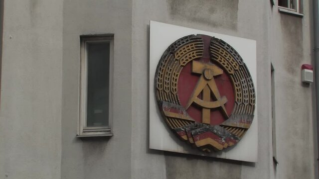 Hammer und Sichel at Haus am Checkpoint Charlie near former border crossing Checkpoint Charlie in Berlin, Germany