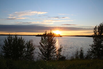 Naklejka premium sunset over lake