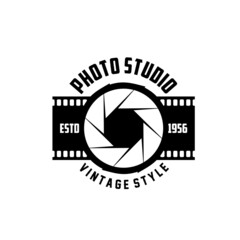 Photo studio vintage vector icon with camera diaphragm shutter and film strip. Photographer optical equipment and photography item isolated monochrome symbol of photo studio and photography workshop
